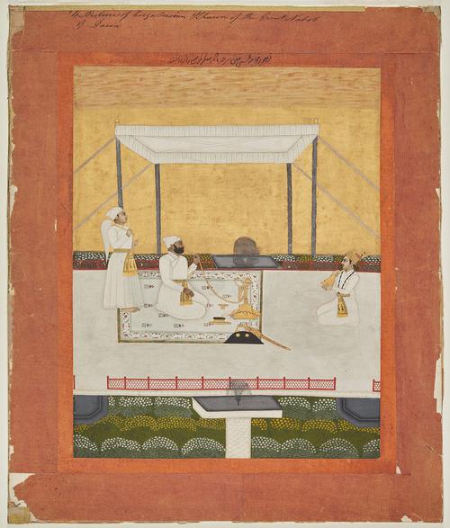 A Musician plays an instrument sitting in front of a man under a canopy smoking a hooka in a garden with a gold sky. Large orange boarder around the painting. 