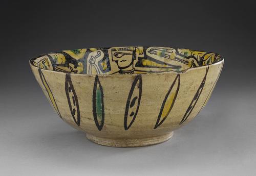 Outside of bowl, alternating buff colour, yellow and green almond shapes.