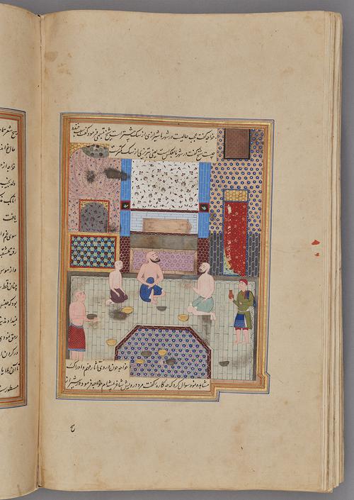  Painting within a rectangular border of blue, gold, green, and red, with script across the top and bottom. A scene of a colourfully tiled bath house depicts three figures kneeling and two figures standing, some with bowls.   