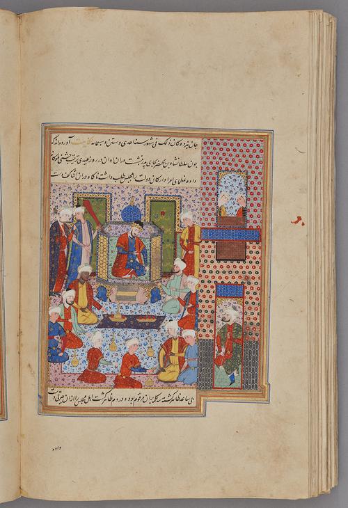 Painting within a rectangular border of blue, gold, green, and red, lines of script at the top and bottom. Interior court scene, figures standing and kneeling in front of a figure wearing a crown.   