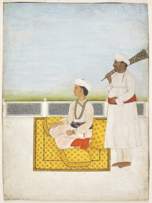 Painting depicting a white terrace with a low strip of green landscape beyond the parapet, and a pale blue-sky backdrop. Mirza Salim sits in profile on a yellow carpet and cushions, dressed in white with orange trousers. His retainer Turbiyat Khan stands behind him holding a peacock-tail flywhisk over his shoulder. 